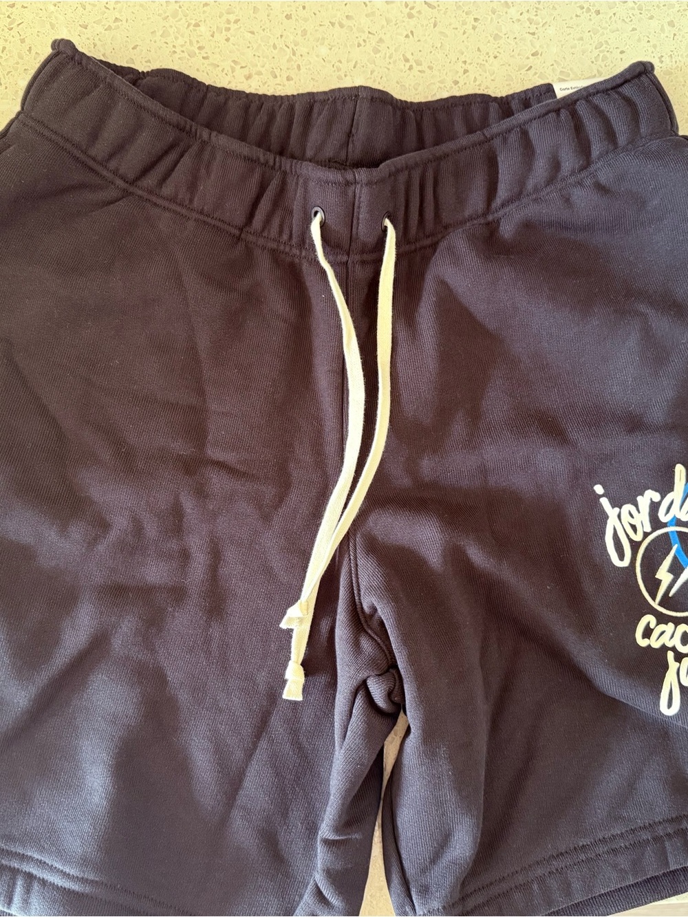 Jordan Black Athletic Shorts with Cream Drawstring and Logo